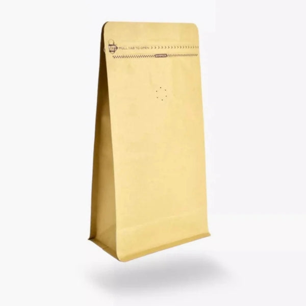 Gold coffee bag on a white background